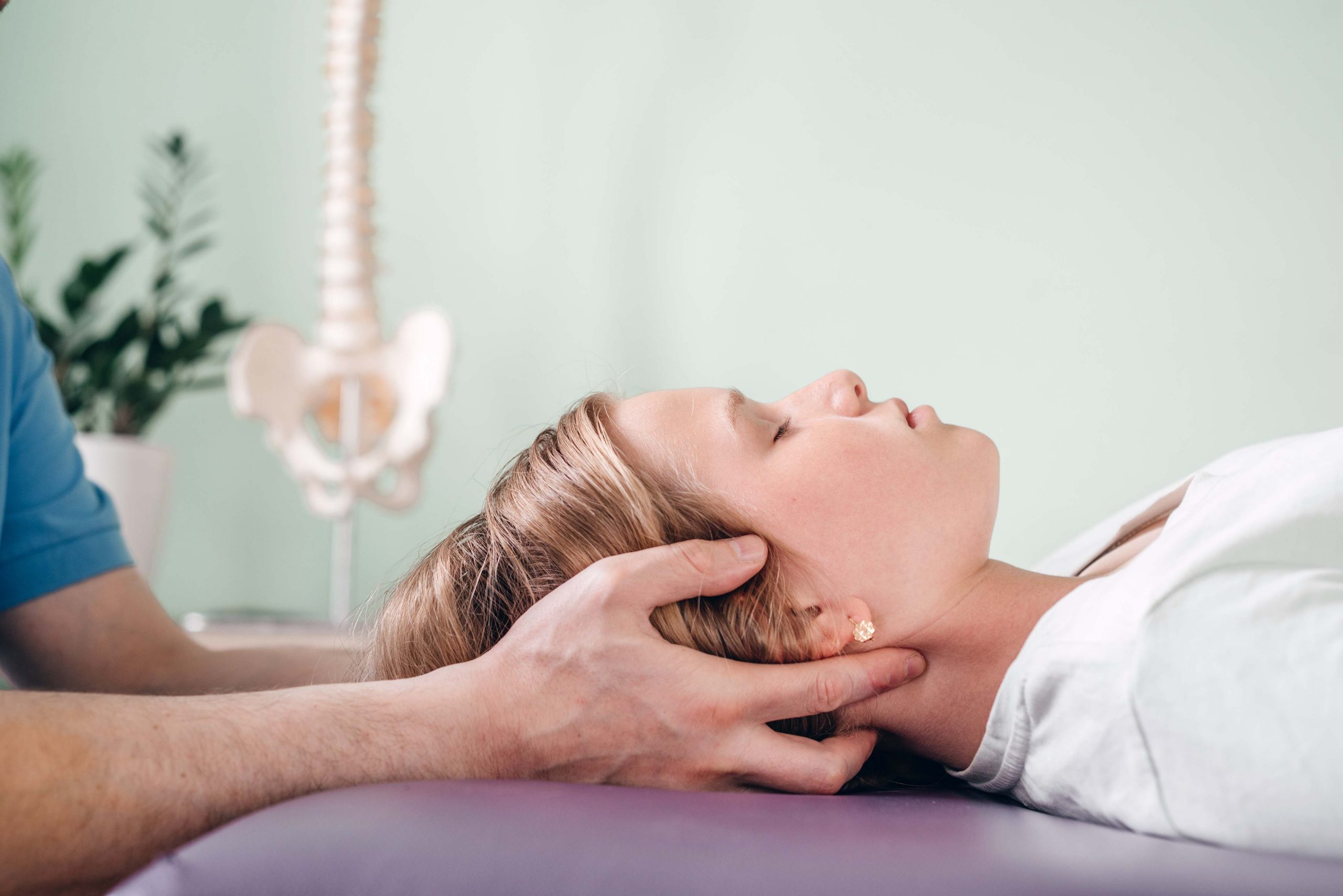 St. Albert Massage | man massage clients neck