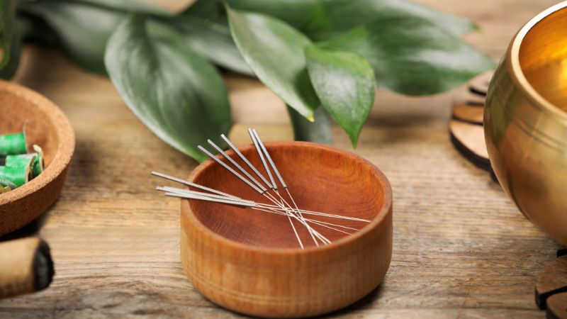 acupuncture needles in bowl